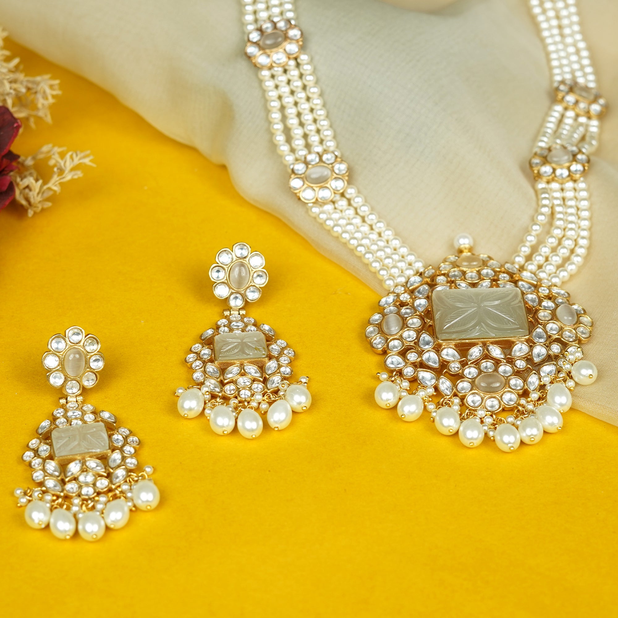 How to Style Zevar Club's White Kundan Pendant Necklace Set with Pearl Beads for Any Occasion