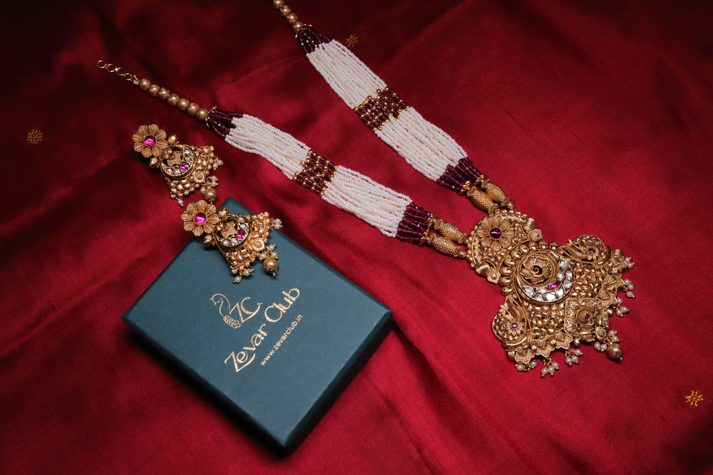 Elevate Your Ethnic & Fusion Look with the 22K Gold Plated Fine Pearls Set in Red