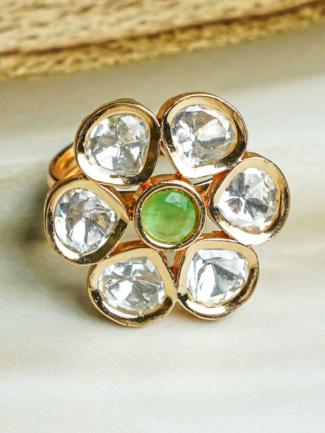 Zevar Club Gold-Toned White Kundan Studded Floral Adjustable Ring with Green Center Stone