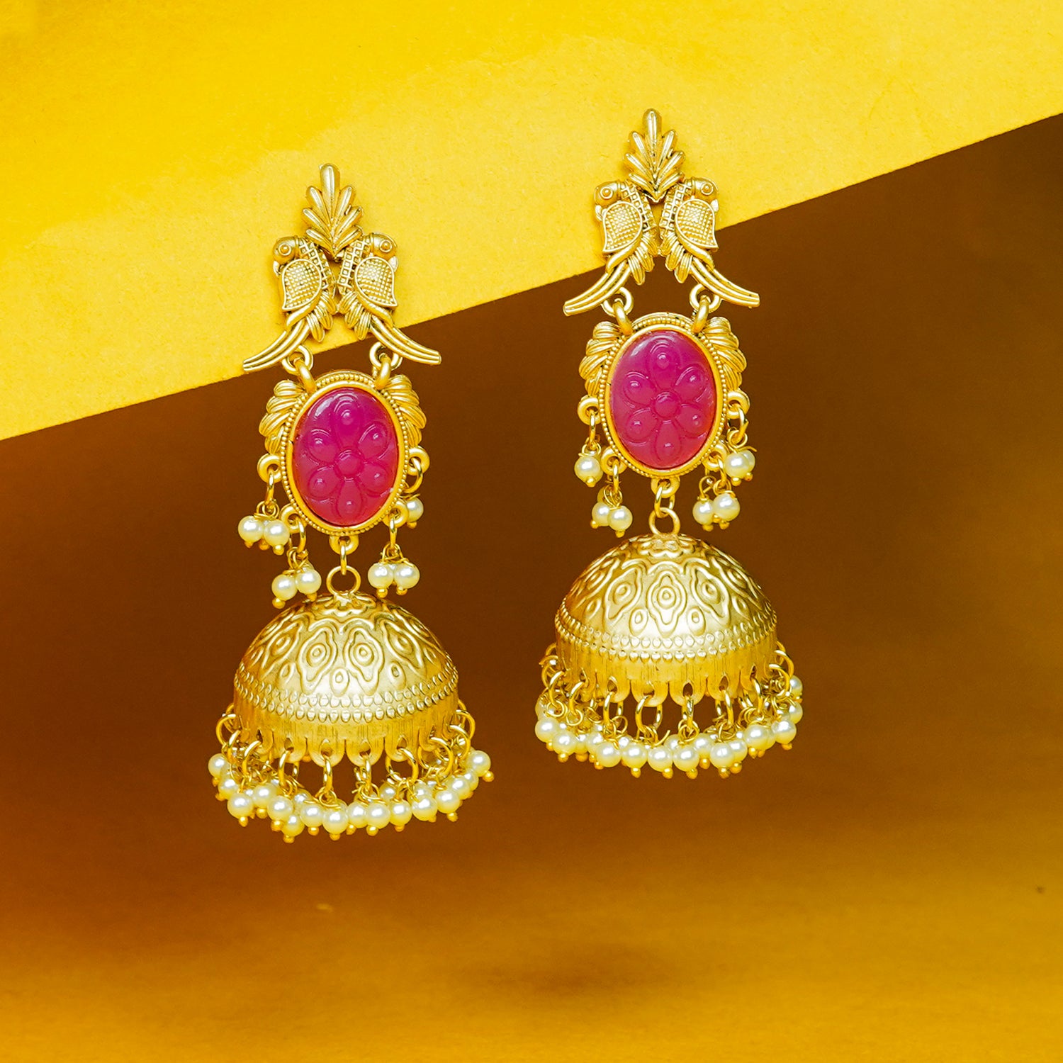 Zevar Club 22K Gold-Plated Green Carved Stone Jhumka Earrings with Bird Motif & Pearls Drops