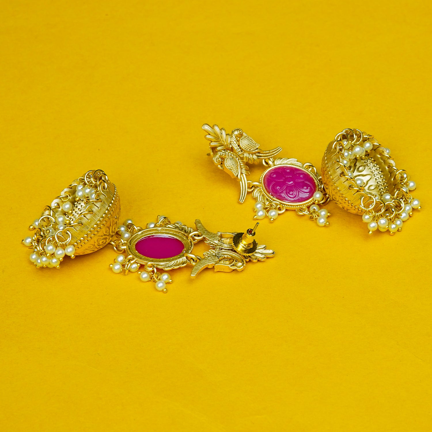 Zevar Club 22K Gold-Plated Green Carved Stone Jhumka Earrings with Bird Motif & Pearls Drops