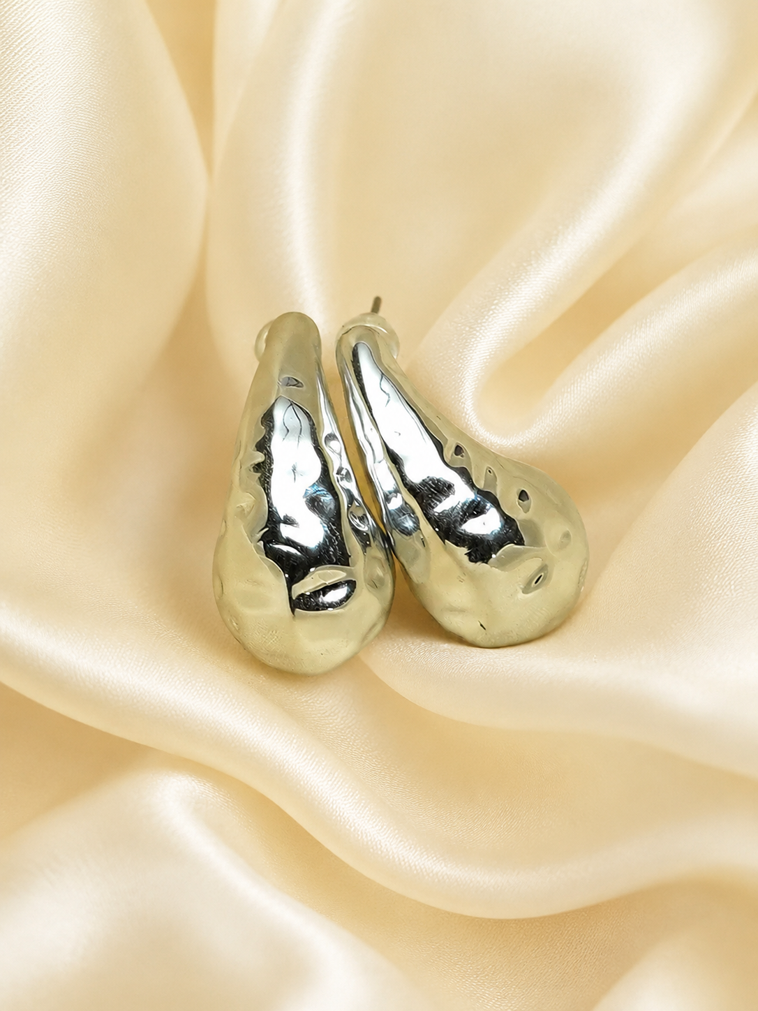 Zevar Club Glossy Silver Tone Stainless Steel Tarnish Free Waterproof Sculpted Tear Drop-Shaped Stud Earrings for Women