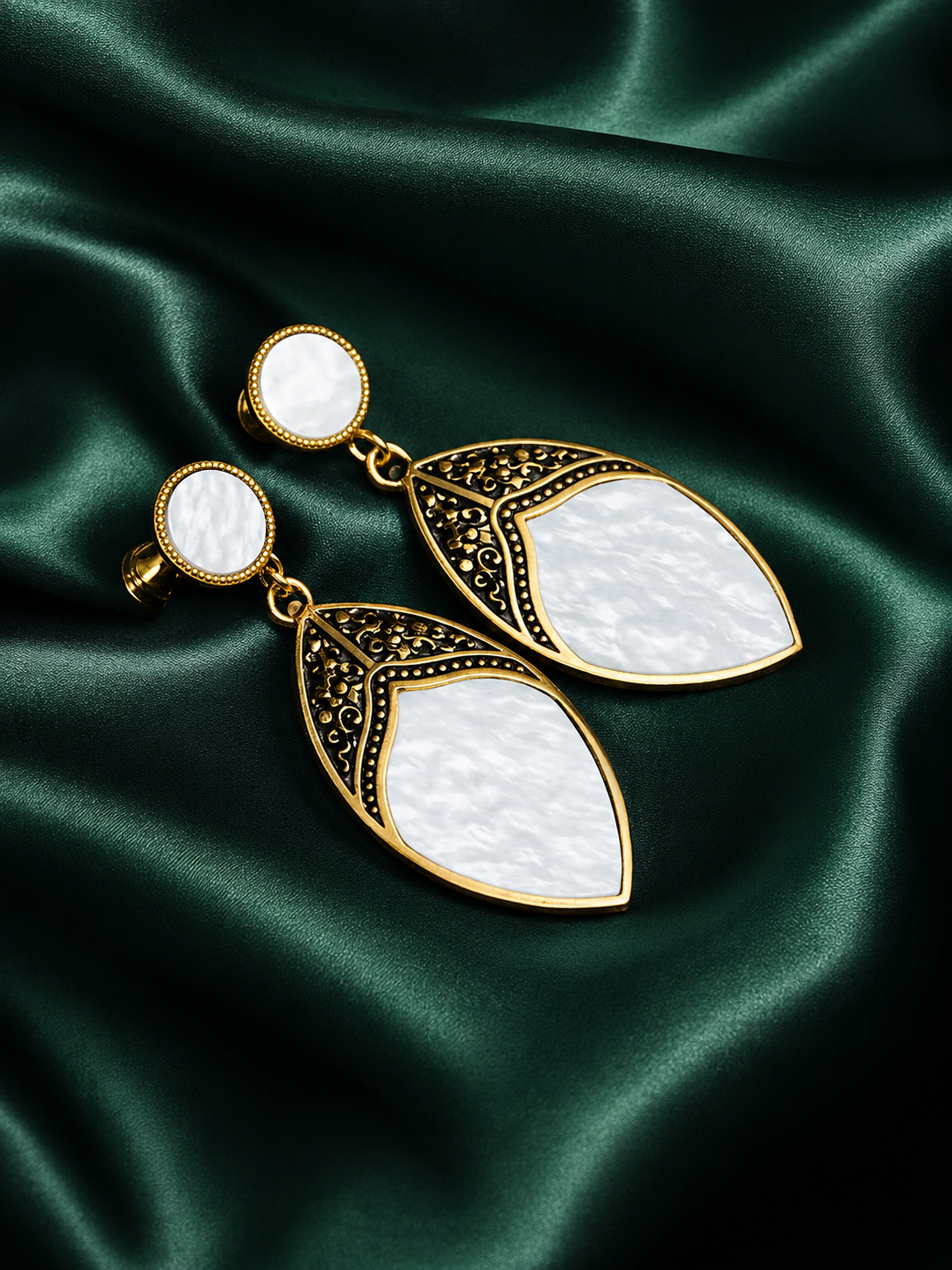 Zevar Club Gold-Toned White Leaf Drop Earrings with Antique Embossed Detailing