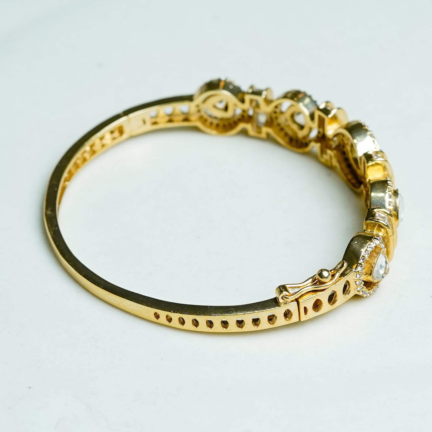 Zevar Club Gold-Toned White Kundan & Cubic Zirconia Studded Emerald Green Luxury Statement Bracelet
