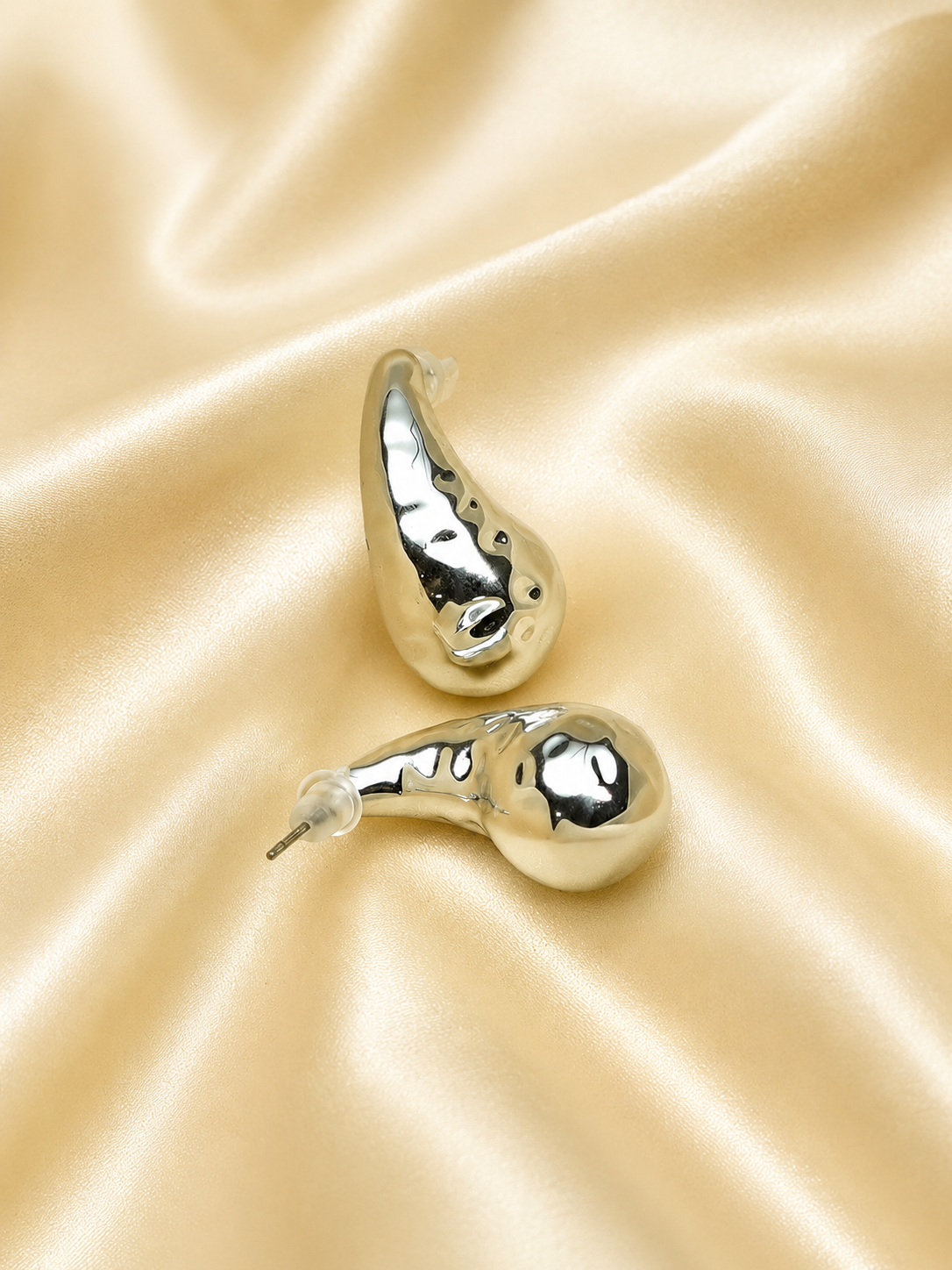 Zevar Club Glossy Silver Tone Stainless Steel Tarnish Free Waterproof Sculpted Tear Drop-Shaped Stud Earrings for Women