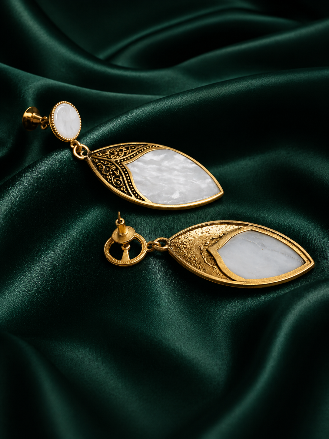 Zevar Club Gold-Toned White Leaf Drop Earrings with Antique Embossed Detailing