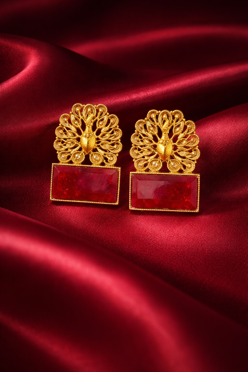 Zevar Club Brass Gold-Toned Statement Peacock Motif Earrings with Emerald Red Rectangular Stones