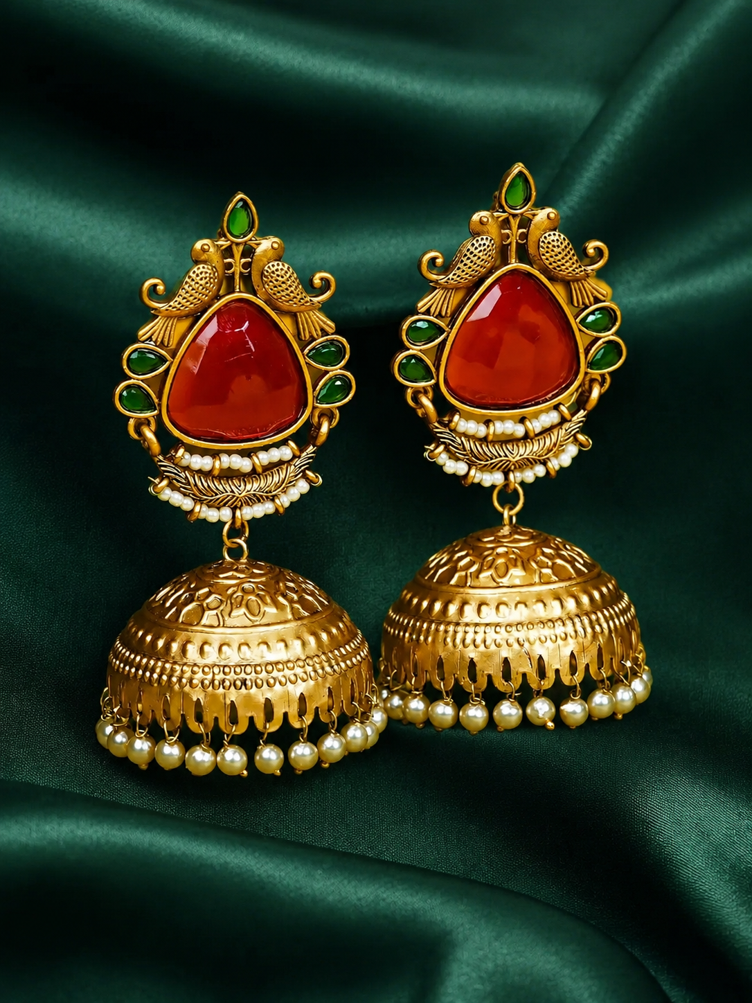 Zevar Club Brass Gold-Toned Bird Motif Ethnic Jhumka Earrings with Red Green Stones & Pearls